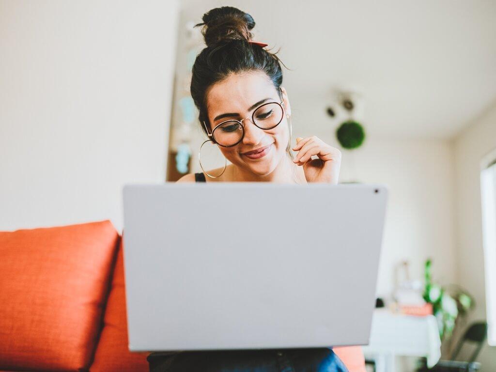 Woman home laptop landscape